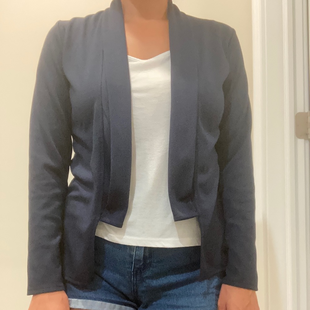 Navy cardigan, flattering, size M.